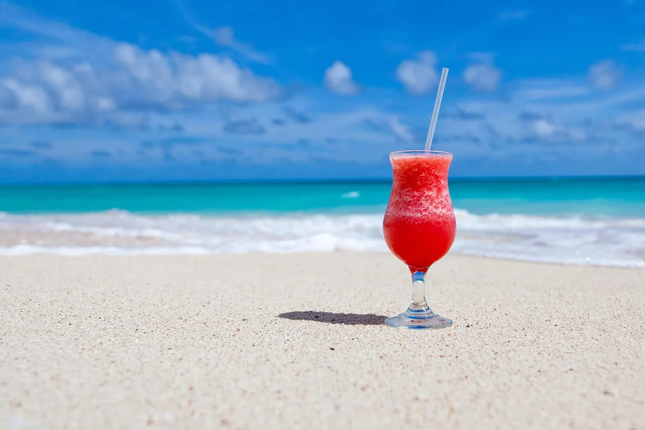 drink, cocktail, beach, beverage, refreshment, alcoholic drink, alcoholic beverage, glass, coast, sand, shore, seashore, paradise, tropical, nature, caribbean sea, caribbean