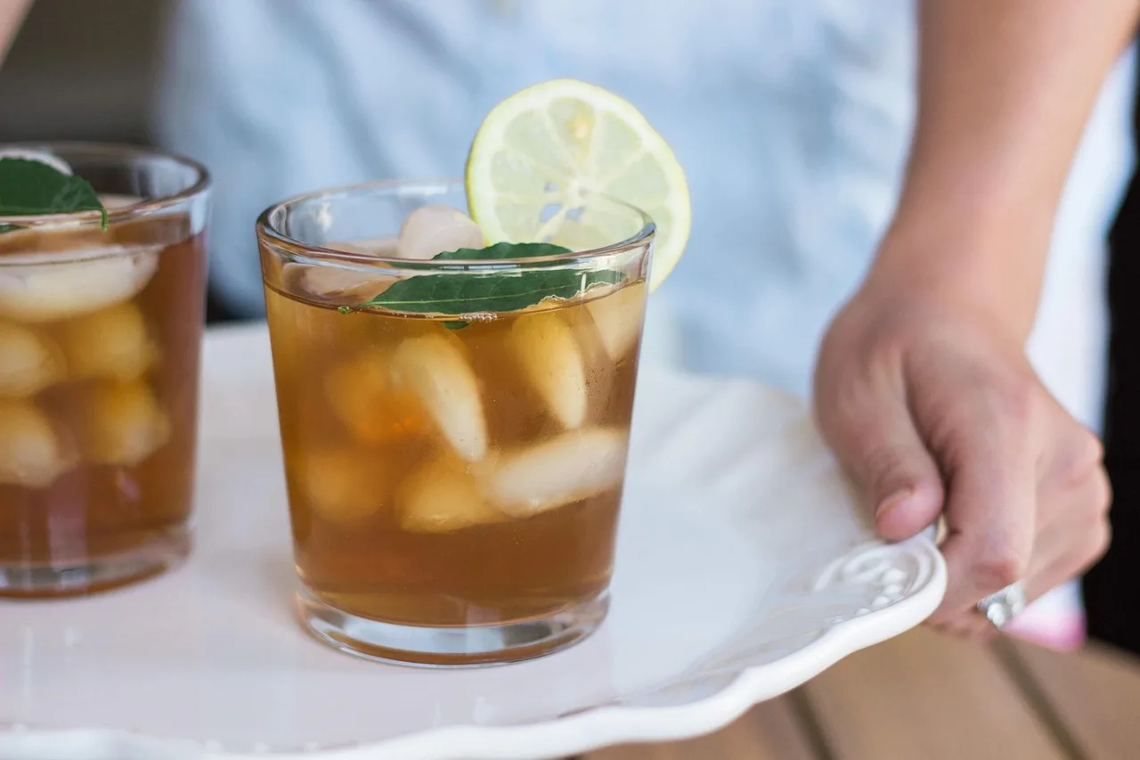 beverage, cold, drink, fruit, glass, hand, ice, iced tea, juice, lemon, mint, person, refreshment, tray, iced tea, iced tea, iced tea, iced tea, iced tea. 4 things to check in nonalcoholic bar tools