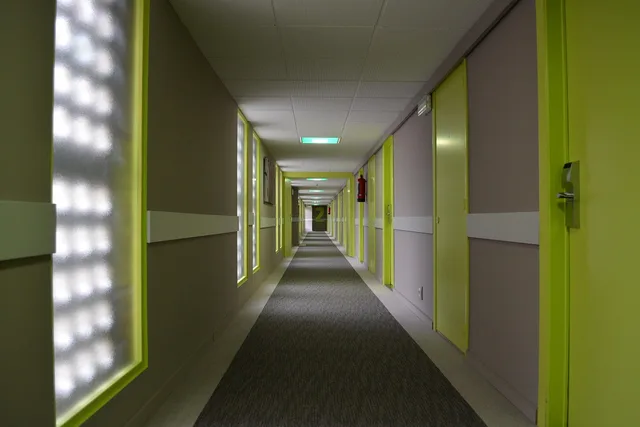 hotel, hallway, perspective, aisle, ostend hotel, hotel, hotel, hotel, hotel, hallway, hallway, hallway, hallway, hallway, aisle, aisle, aisle. Zero-proof drinks in US hotels: minibar restocking and menu rules